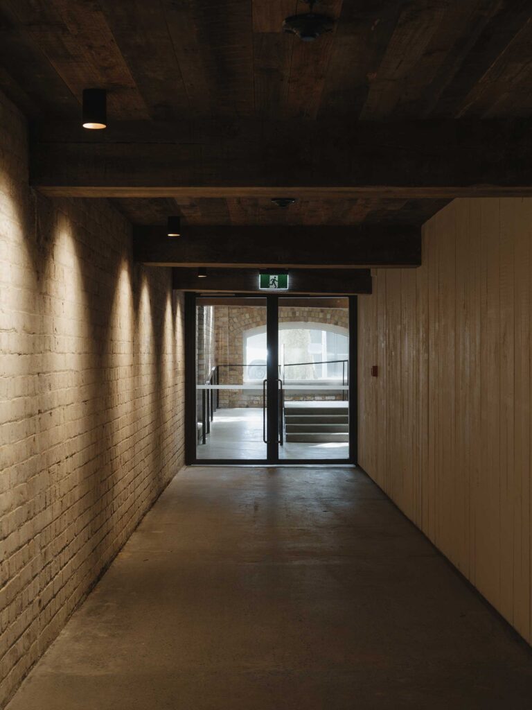 Stage Two shifted to the St Georges Bay Road entrance, upgrading the space with timber cladding, new finishes, and fire-rated treatments to improve both function and appearance.